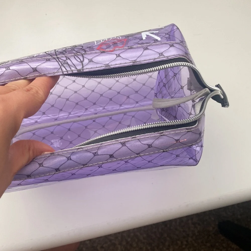 Purple plastic victorious secret makeup bag